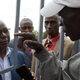 Pak Kariuki, Athletics Kenya Treasurer, left, talks with former athlete Phinon Chepkwon, at the Kenya Athletic offices on Nov. 23.